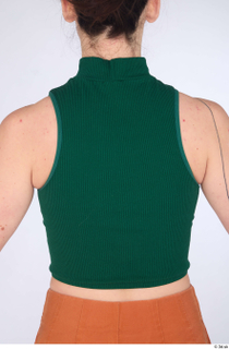 Zolzaya casual dressed green turtleneck sleeveless crop top upper body…